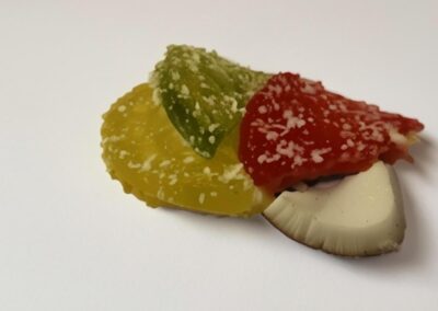 Marmeladinės puselės su kokoso drožlėmis 2 Saldainiai su kokosu